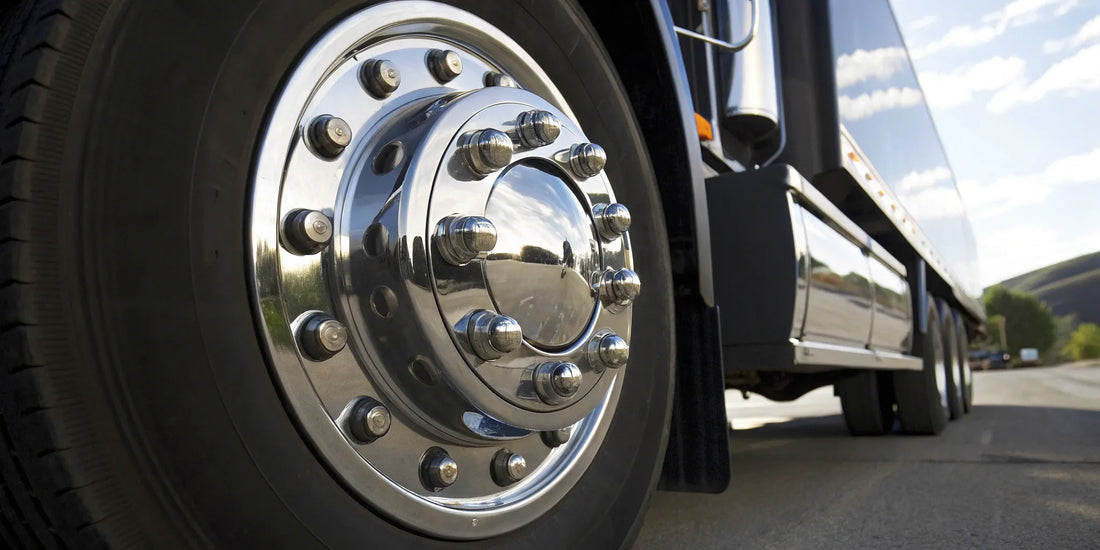 Close-up of a semi truck wheel hub and its critical oil seal.