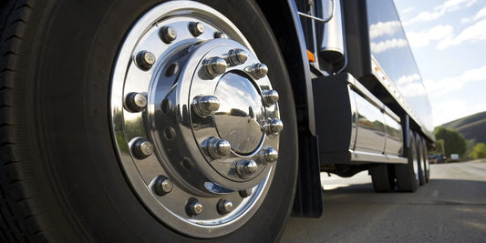 Close-up of a semi truck wheel hub and its critical oil seal.