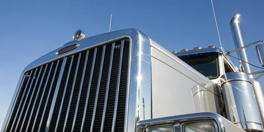 A semi truck's chrome grille, a common item when searching for truck parts online.