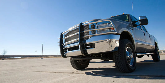A compliant rear impact guard installed on a straight truck.