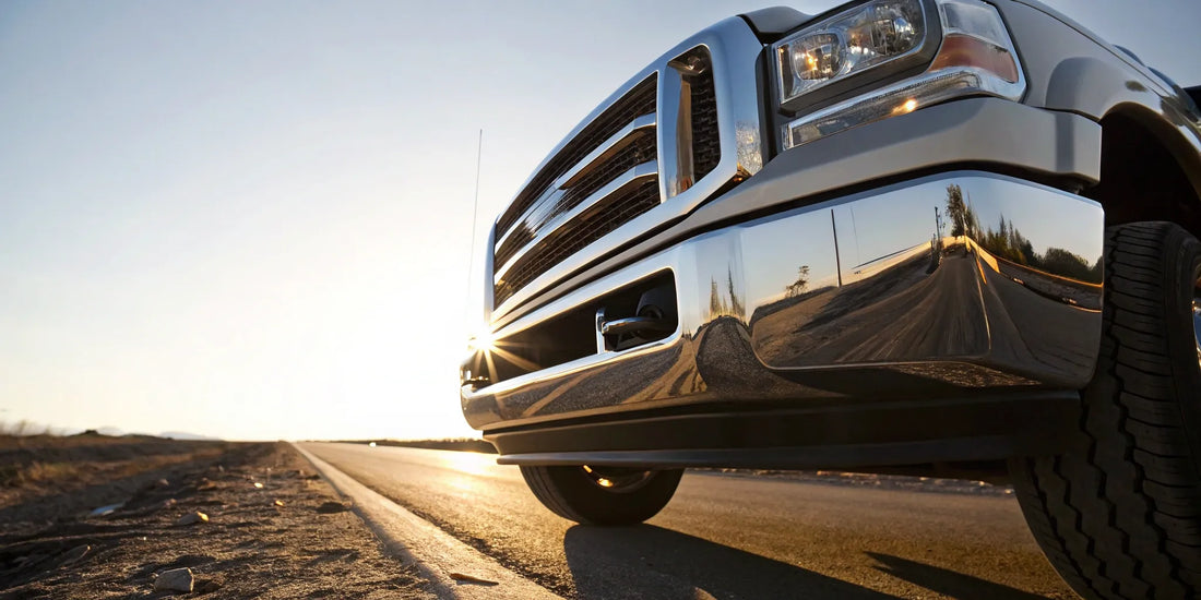 A pickup truck featuring a heavy-duty aftermarket front bumper.